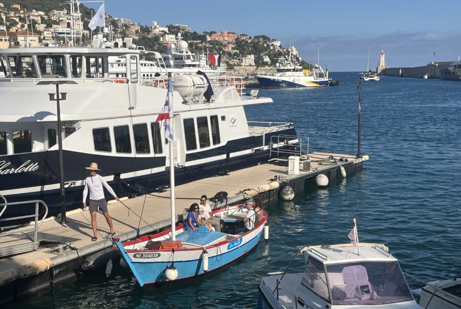 Lou Passagin traditional boat crossing Nice Harbour at Port Lympia